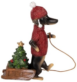 Tacskó piros pulcsiban szánkóval karácsonyi figura