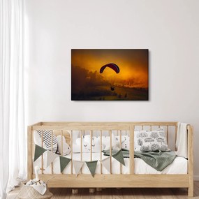 Ejtőernyős a naplementében képe (90x60 cm)