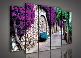 Vászonkép 150x100 Lila virágok bugenwilla ösvény kőfal