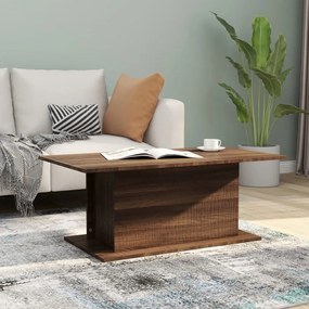 Barna tölgyszínű szerelt fa dohányzóasztal 102x55,5x40 cm
