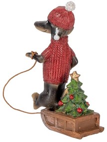 Tacskó piros pulcsiban szánkóval karácsonyi figura