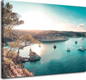 Vászonkép Víz a nap tükrében Csónakok Sziklák 100x80 cm