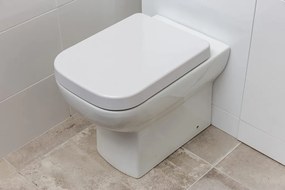 Eros ES CLASSIC - padlón álló WC - ülőkével komplett - perem nélküli öblítés - alsó/ hátsó kifolyású