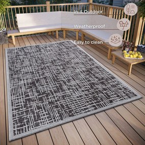 Sötétszürke kültéri szőnyeg 63x120 cm Clyde Telu – Hanse Home