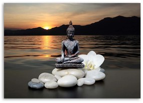 Gario Vászonkép Buddha naplementés háttérrel Méret: 100 x 70 cm