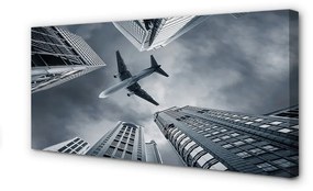 Canvas képek Város felhő repülőgép ég 100x50 cm