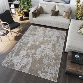 Modern szürke szőnyeg arany motívummal Szélesség: 140 cm | Hossz: 200 cm