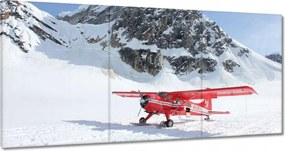 Vászonkép 120x60 Piros repülőgép a hegyekben