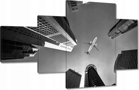 Képek 130x80 Repülőgép a város felett