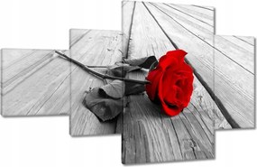 Vászonkép 130x80 Vörös rózsa a deszkákon