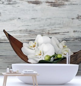 Gario Fotótapéta Fehér orchidea virágai egy régi tábla hátterén Anyag: Vlies, Méret: 150 x 150 cm