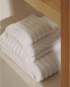 Fehér frottír pamut fürdőlepedő 70x140 cm Navira – Kave Home