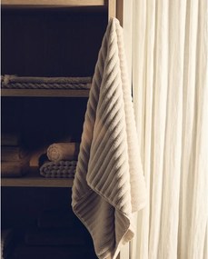 Bézs frottír pamut törölköző 50x90 cm Navira – Kave Home