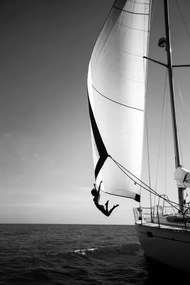 Fotográfia Woman jumping from a yacht into the ocean., Mint Images