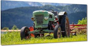 Vászonkép 60x30 Régi traktor az Alpokban