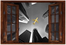 Poszterek 60x40 Sárga repülőgép a város felett