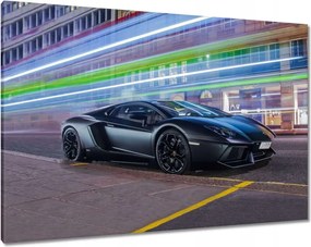Vászonkép 100x70 Gyors autó száguld az éjszakában