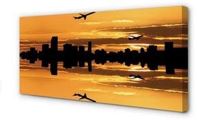 Canvas képek Repülőgép város sun 125x50 cm