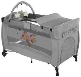 Utazóágy pelenkázó lappal és játékhíddal, szürke