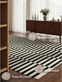 Fekete-fehér kétoldalas kézi szövésű gyapjú szőnyeg 200x300 cm Donna – Hanse Home