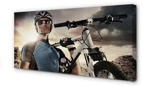Canvas képek Kerékpáros kerékpár felhők 120x60 cm