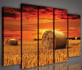 Vászonkép 150x100 Naplemente mező szalma kévék ősz tájkép vidéki nyugalom