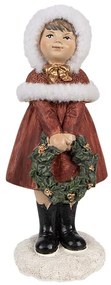 Kislány piros ruhában koszorúval karácsonyi dekoráció