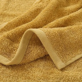 Goldea gyermek frottír törölköző - markolós a mustár színűn 30 x 50 cm