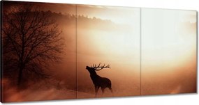 Vászonkép 180x90 Szarvas az erdő szélén