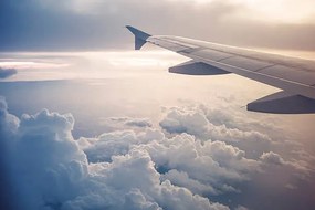 Illusztráció Image of airplane wing flying above the clouds, Moazzam Ali Brohi