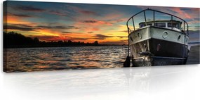 Vászonkép 145x45 Naplemente a vízen Csónak a parton esti nyugalom