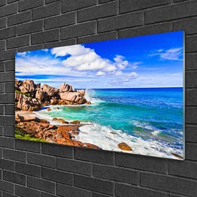 Üvegkép falra Tengeri táj Rocks Beach 125x50 cm