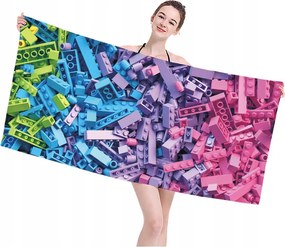 Strandtörölköző 100x210 rózsaszín lila kék zöld lego