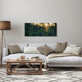 A ragyogó nap képe a fák gallyain keresztül (120x50 cm)