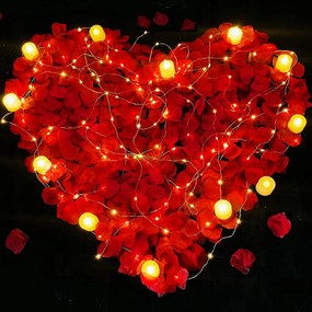 12 db lĂĄngmentes Led gyertya Ă©s 300 db rĂłzsaszirom eskĂŒvĆ randi bĂĄl