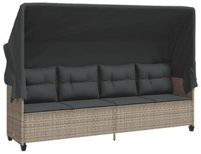 Világosszürke polyrattan napozóágy tetővel és párnával
