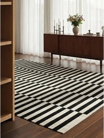 Fekete-fehér kétoldalas kézi szövésű gyapjú szőnyeg 200x300 cm Donna – Hanse Home