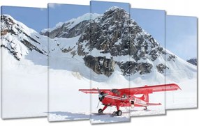 Vászonkép 100x60 Piros repülőgép a hegyekben
