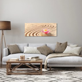 Egy kő, virággal a homokban képe (120x50 cm)