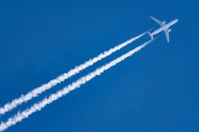 Illusztráció The airplane flying in the blue sky in Japan, Taro Hama @ e-kamakura