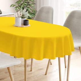 Goldea loneta dekoratív asztalterítő - mélysárga színű - ovális 140 x 280 cm