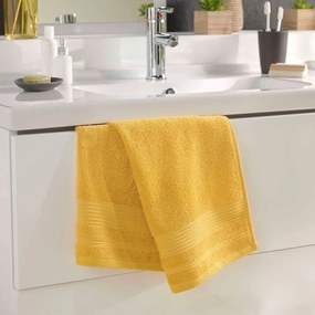 Sárga frottír pamut törölköző 50x90 cm Tendresse – douceur d'intérieur