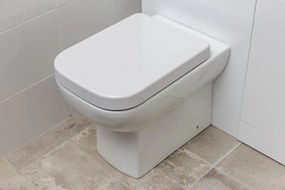 Eros ES CLASSIC - padlón álló WC - ülőkével komplett - perem nélküli öblítés - alsó/ hátsó kifolyású