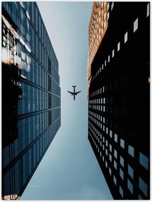 Poszterek 30x40 Repülőgép az épületek között