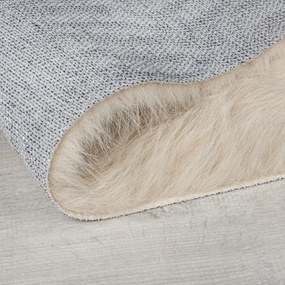 Bézs szintetikus szőrme szőnyeg 80x150 cm Alpine Faux Fur – Flair Rugs