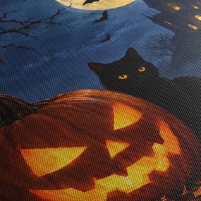 Kép - Fekete macska egy világító halloweeni tök mellett (120x50 cm)
