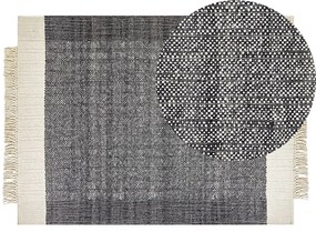 Fekete és törtfehér gyapjúszőnyeg 140 x 200 cm ATLANTI Beliani