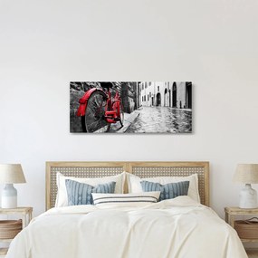 Egy vörös kerék képe egy macskaköves utcán (120x50 cm)