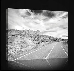 Vászonkép 80x60 Út sivatag sziklák ég felhők utazás szabadság