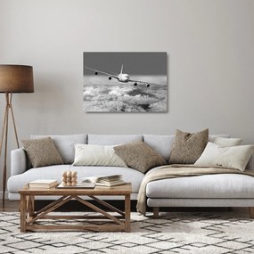 Üveg kép - Repülőgép a felhőkben, fekete-fehér (70x50 cm)